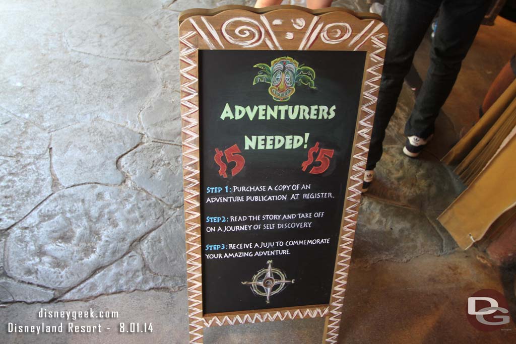 Inside a sign that sums up the experience.  You become an Adventurer.  You choose an adventure and pay $5 for a publication that explains it (or you can opt for a beverage that costs $7.50).  You then set off on our journey and complete the task.  You return and receive a Juju to mark the event and commemorate the adventure.