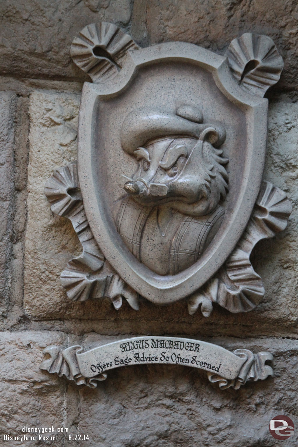 Next stop Mr. Toads Wild Ride.. the line was just barely outside, less than 10 minutes.  First up a look at the character plaques in the garden.