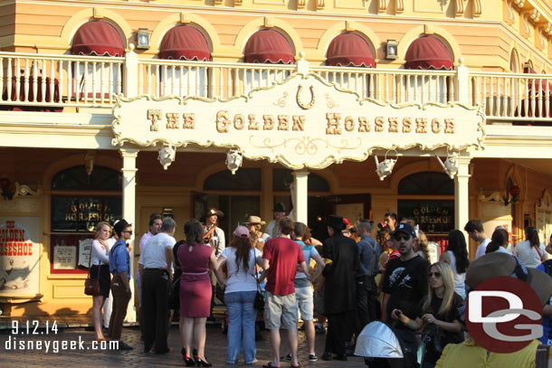 A group gathered outside the Golden Horseshoe