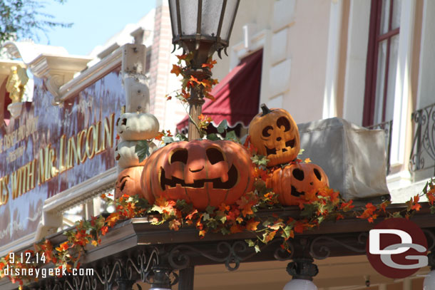 Main Street is home to the pumpkin festival.  The red, white and blue of summer is gone and orange, yellow and pumpkins now on the buildins.