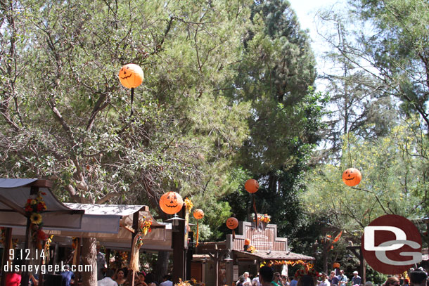 Overhead some pumpkin lanterns