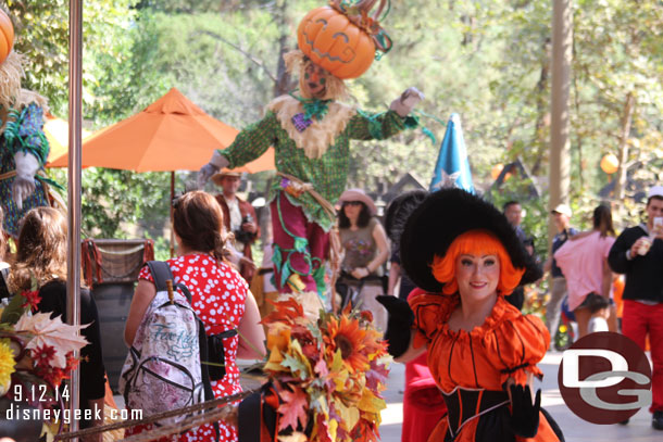 To exit they have a procession with the dancers, stilt walkers and Mickey around the area.