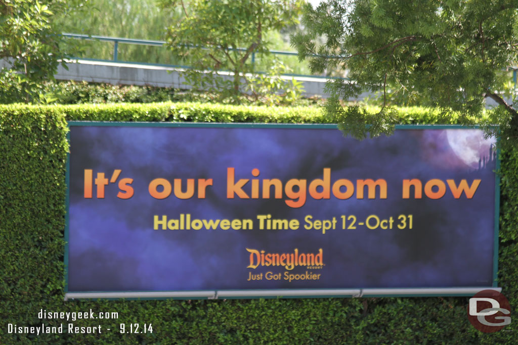 The Mickey and Friends Tram Stop features Halloween Time Billboards