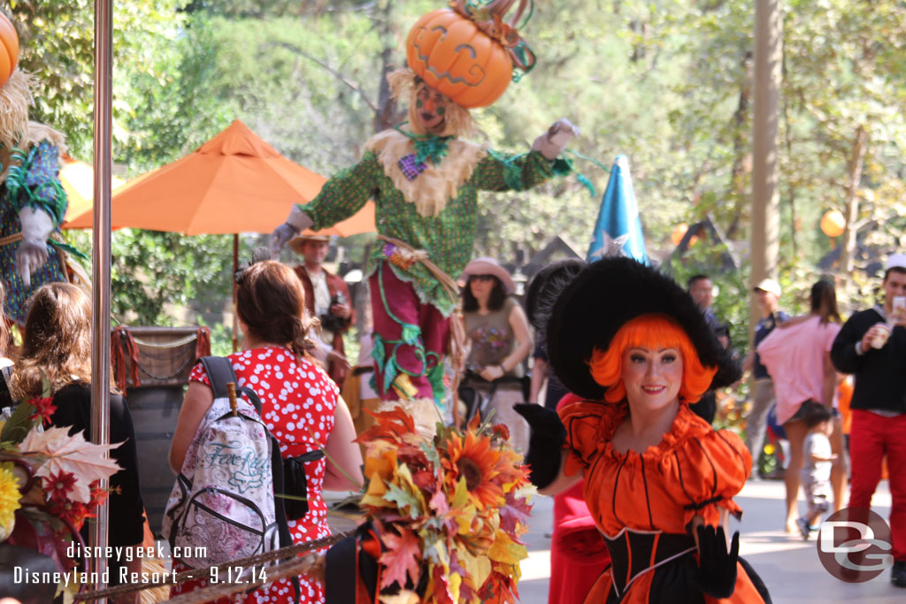 To exit they have a procession with the dancers, stilt walkers and Mickey around the area.