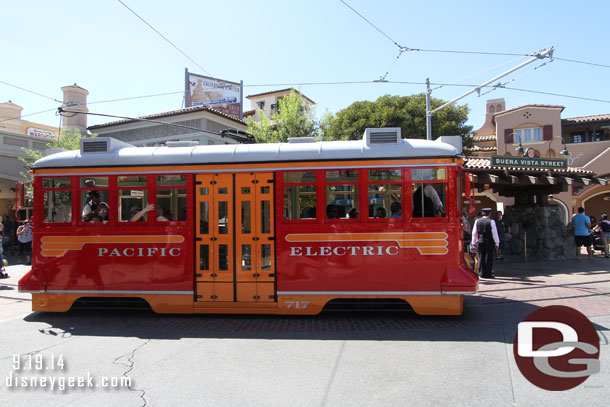 A Red Car pulling into the stop.