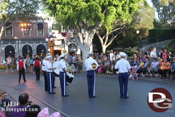 They stopped short of the center of the street and turned away to perform... hmm..  the stage manager was near me and I asked her if they were going to turn around and she had no idea why they stopped and turned the way they did.