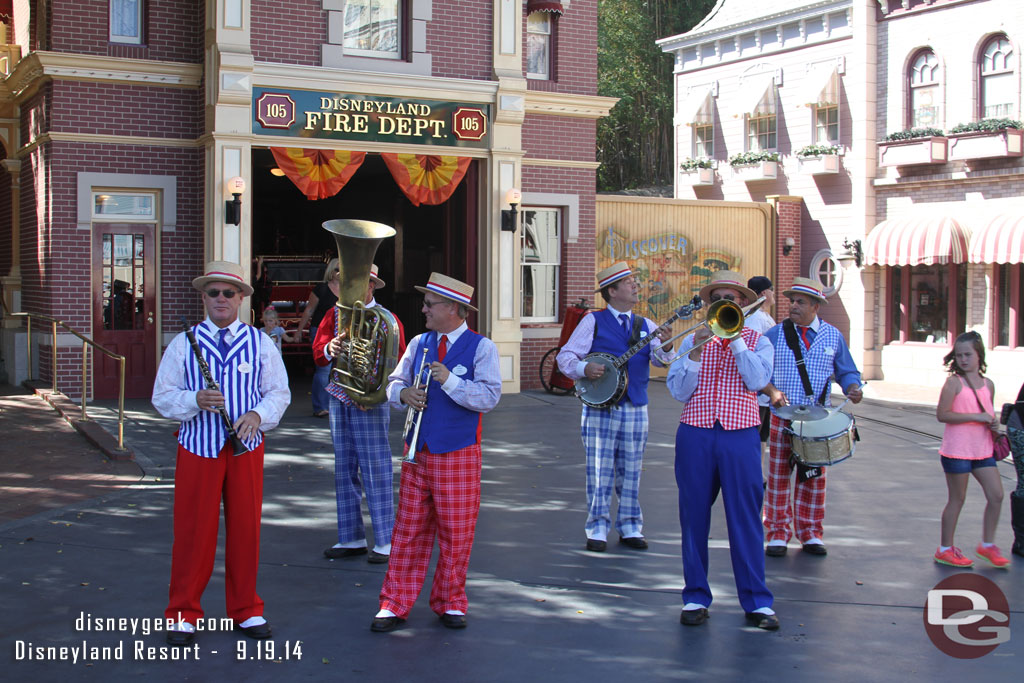 The Straw Hatters performing near the Fire House