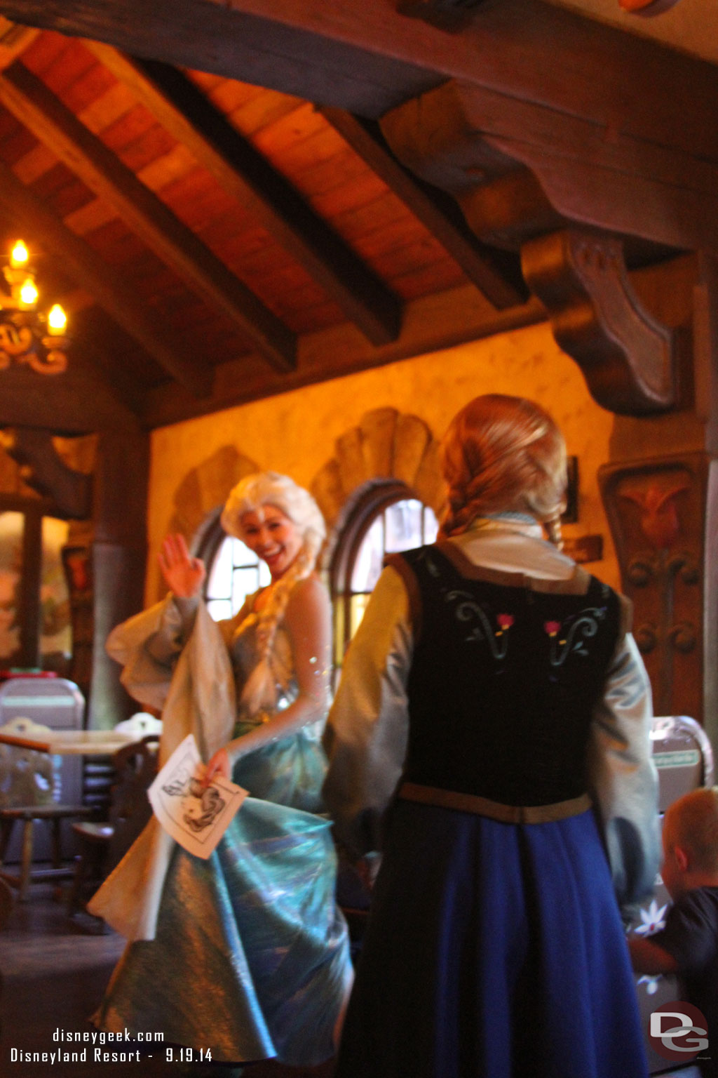 Anna and Elsa passing by while I was eating... wrong lens and setting on the camera though.