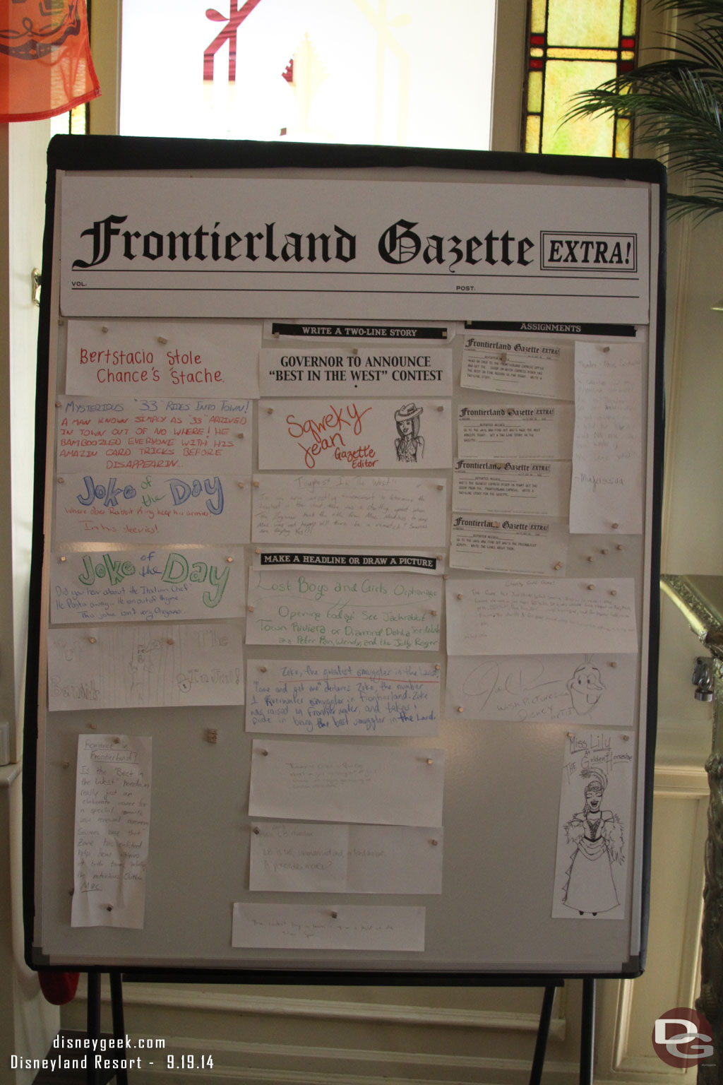 Inside the Golden Horseshoe a Frontierland Gazette board.