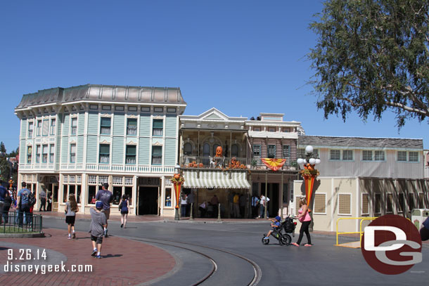 The Scaffolding is down around the Disney Showcase.  On the right a temporary ramp as they work on the curb area.