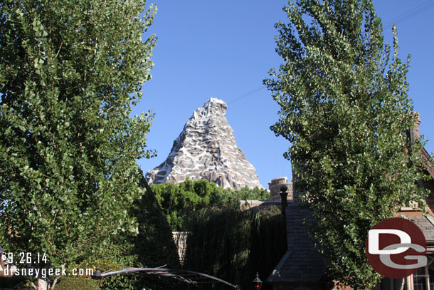 The Matterhorn towering over the queue for Mr. Toad