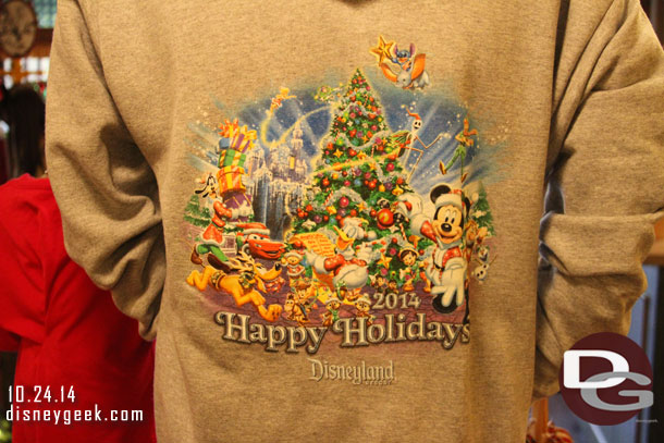 The 2014 Disneyland Resort Happy Holidays design on a sweatshirt.