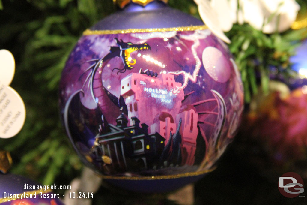 An interesting selection on the ornament.. Tower of Terror, Haunted Mansion, and Maleficent representing Fantasmic.