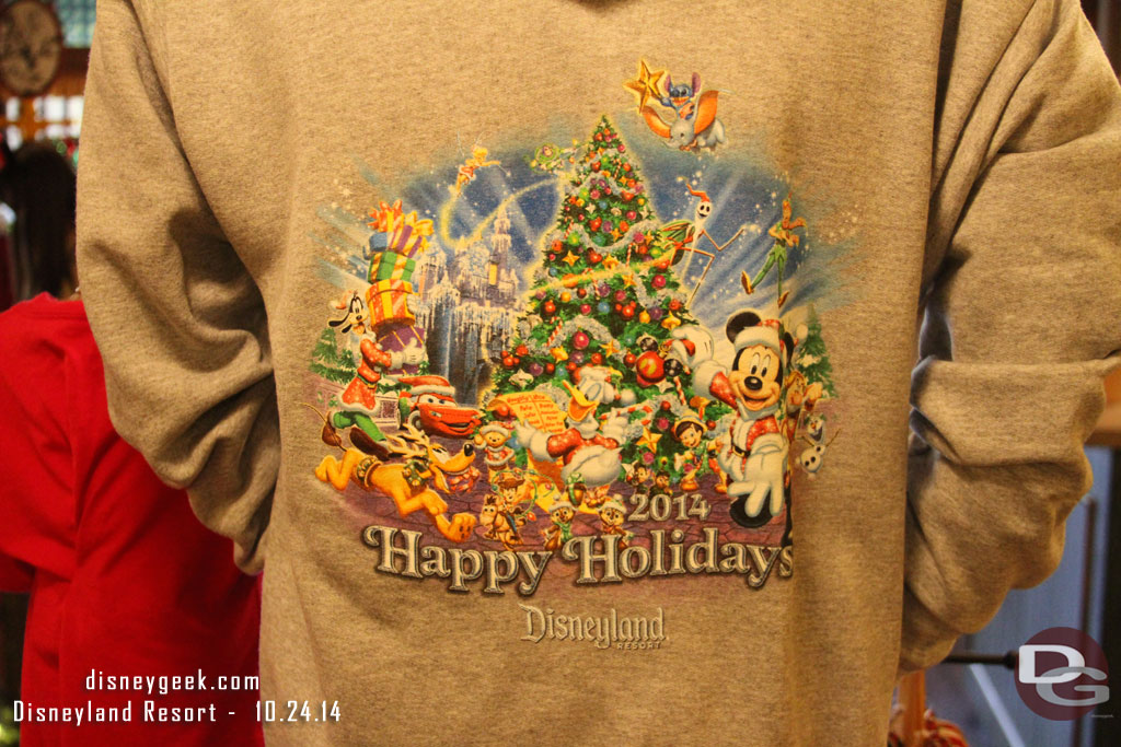 The 2014 Disneyland Resort Happy Holidays design on a sweatshirt.