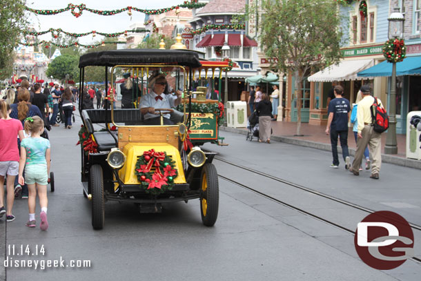 Main Street was alive with activity.  Cars, people, horses all moving about.