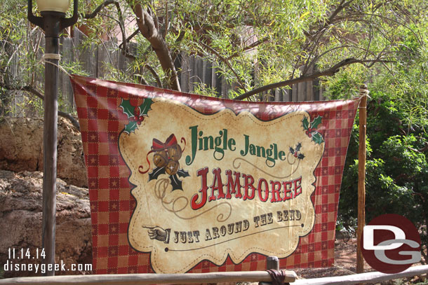 A sign across from the petting zoo entrance for the Jingle Jangle Jamboree.