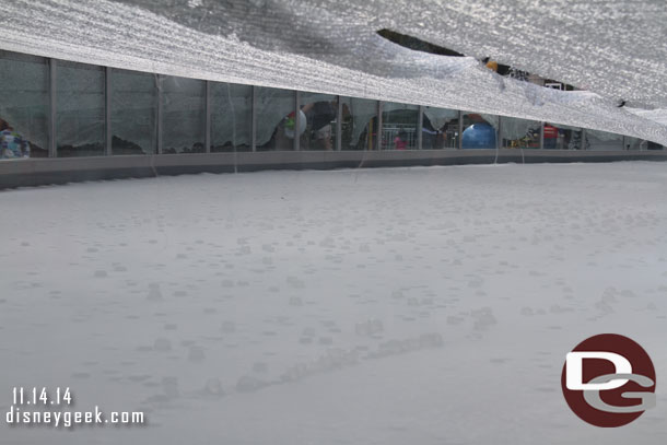 A look through the glass at the ice.  A lot of cubes formed overnight.  (I am assuming they covered it last night and have not touched it since).