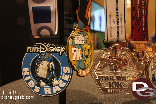 The medals for the upcoming Star Wars races were on display at the runDisney booth.