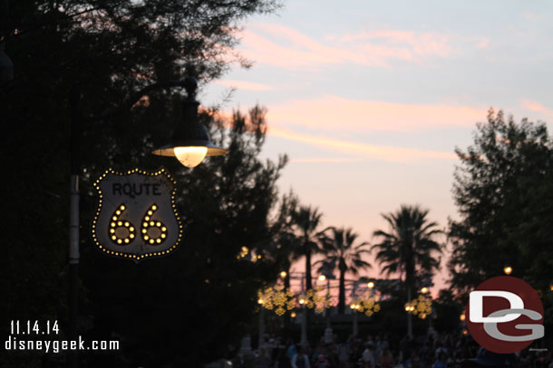 The setting sun and new Route 66 sign, notice the snow flake lights in the background.