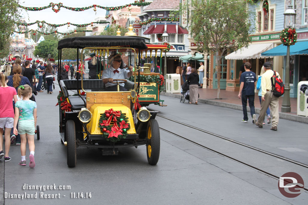 Main Street was alive with activity.  Cars, people, horses all moving about.