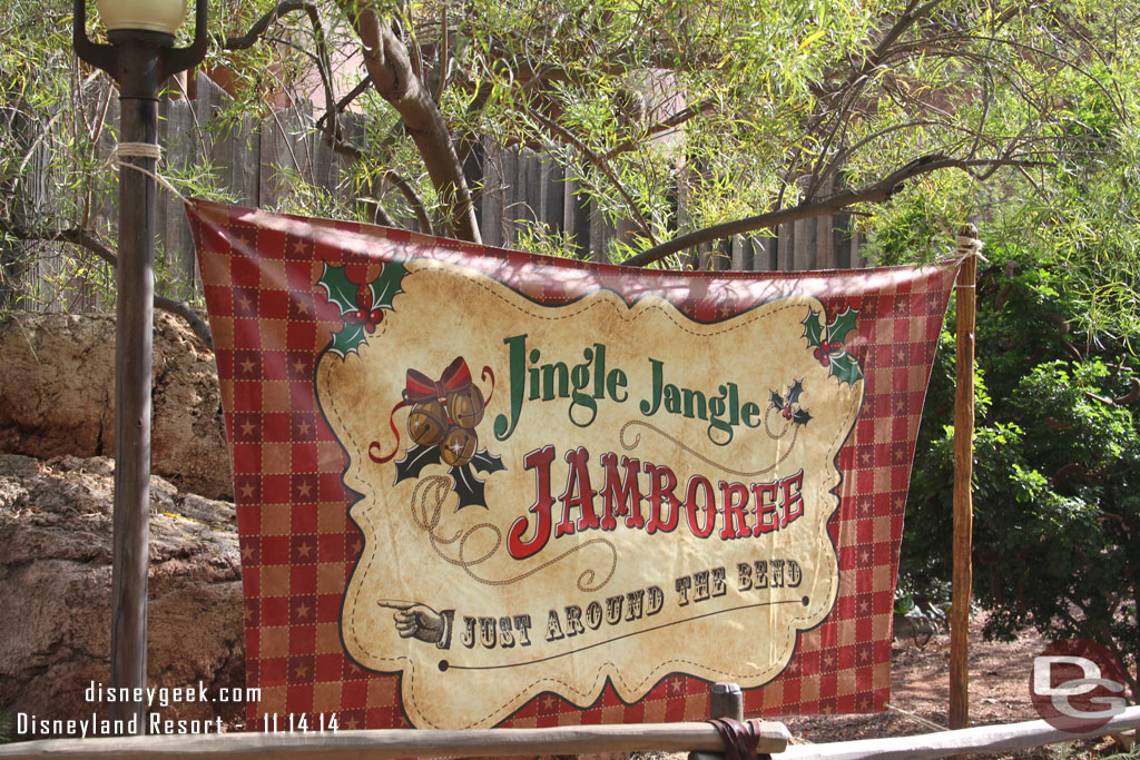 A sign across from the petting zoo entrance for the Jingle Jangle Jamboree.