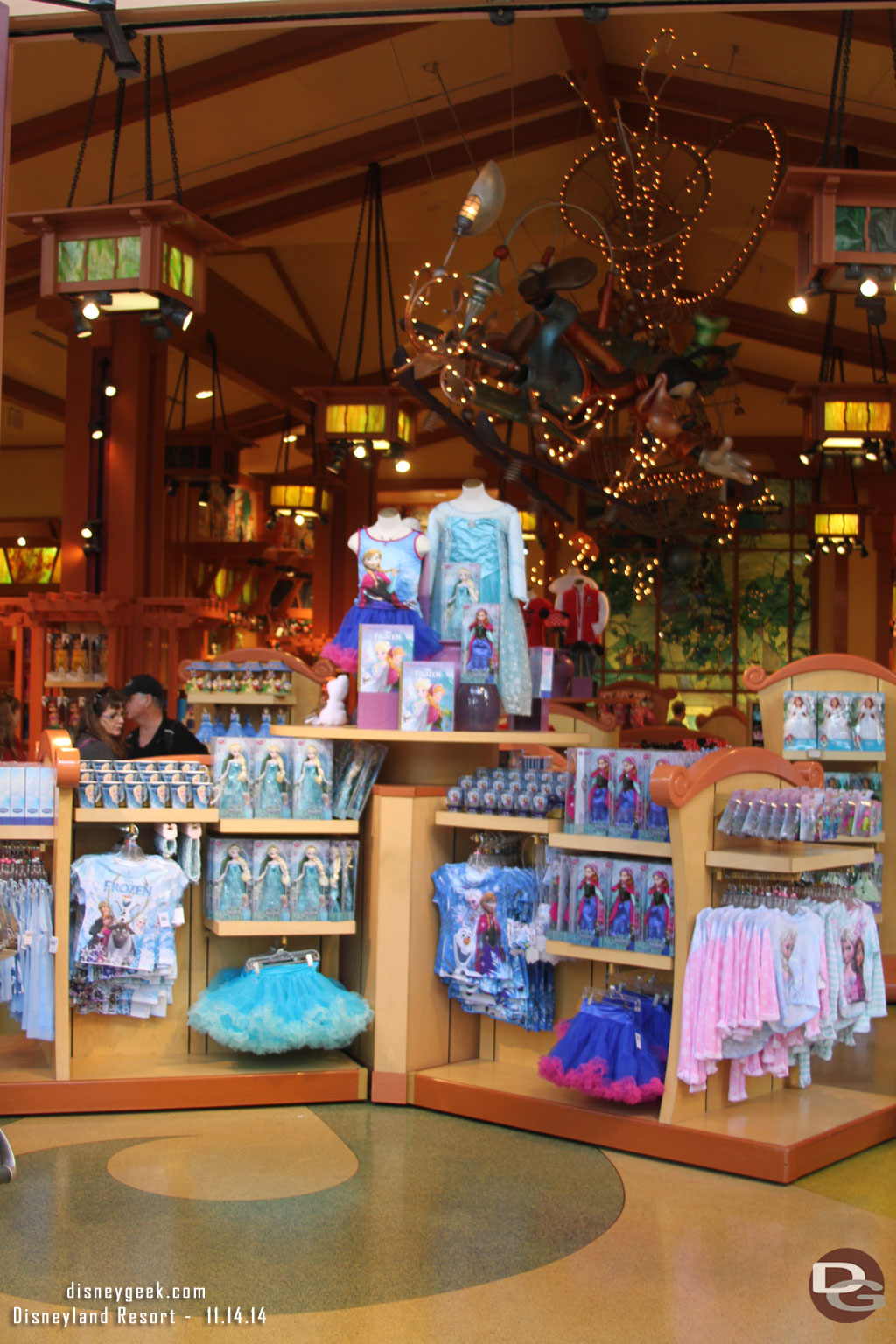 Walked through Downtown Disney.  Frozen merchandise can be found in quite a few locations now.  This is World of Disney.