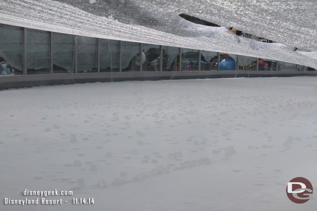 A look through the glass at the ice.  A lot of cubes formed overnight.  (I am assuming they covered it last night and have not touched it since).