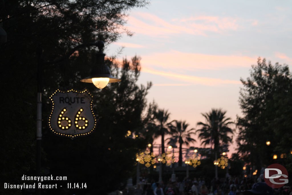 The setting sun and new Route 66 sign, notice the snow flake lights in the background.