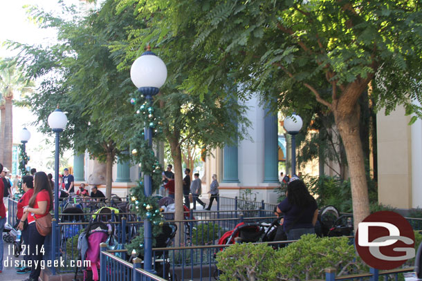 Some of the poles near the stroller parking for the Little Mermaid have garland again this year.