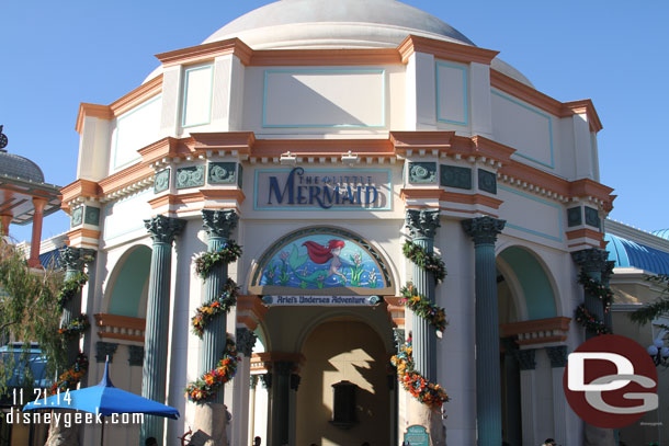 The Little Mermaid building has received garland this year too.