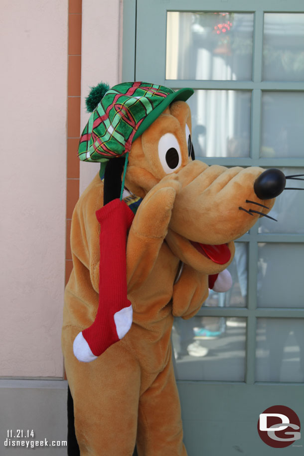 Pluto greeting guests on Buena Vista Street