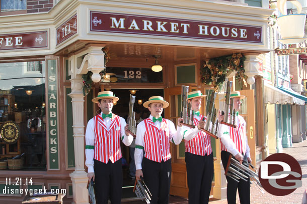 The Dapper Dans of Disneyland performing outside the Market House