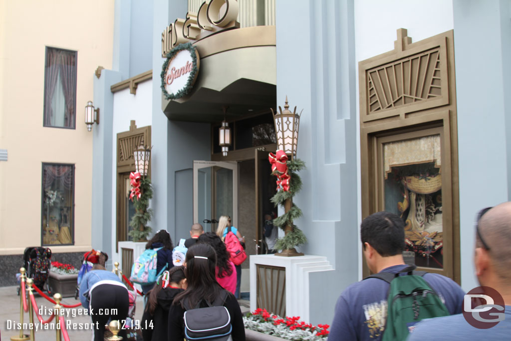 A line to meet Santa this afternoon as everyone is trying to get their last requests in.