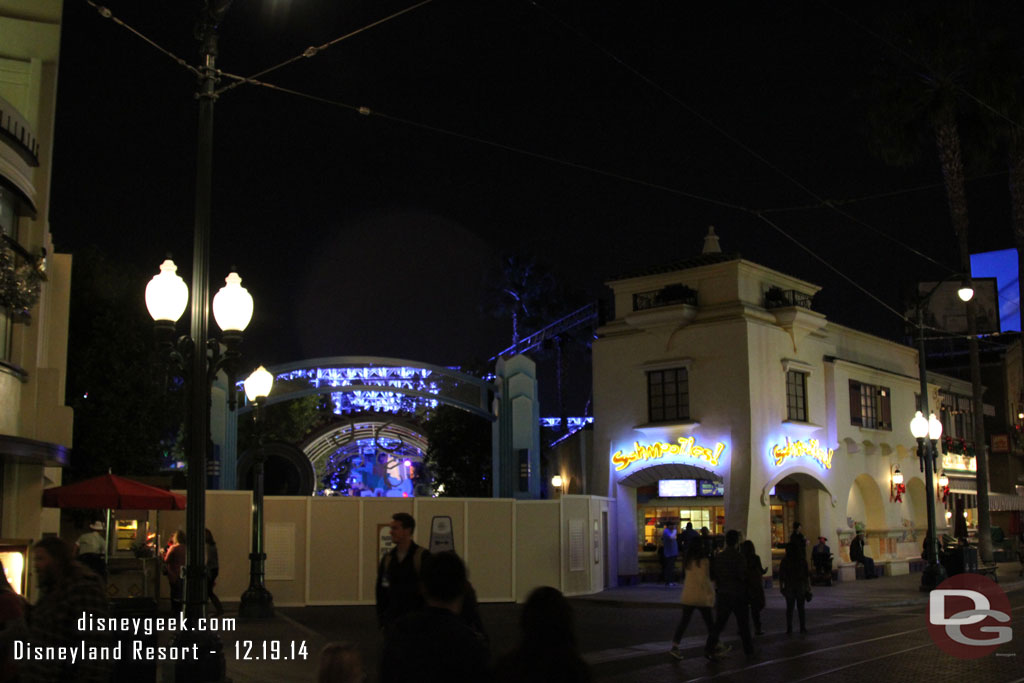 Work continues on the Frozen Fun area after dark.