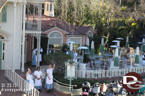 A fair number of Cast Members preparing the River Belle Terrace for Fantasmic dinner guests.