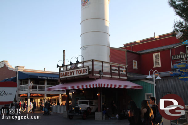 The walls are down and new signs, awnings, and a car at the Bakery Tour.