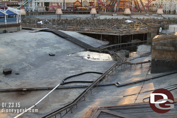 Some of the hoses on the far right and in the middle appear to be what they are using to wash down and suck up the muck.