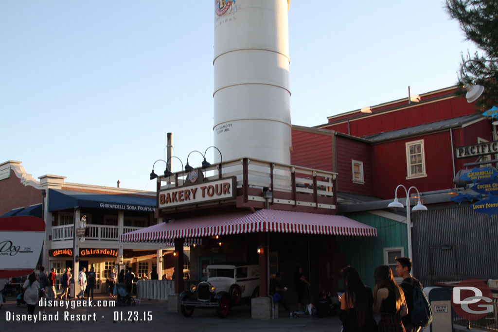 The walls are down and new signs, awnings, and a car at the Bakery Tour.