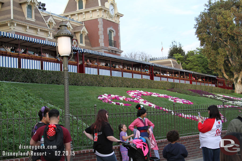 Mulan out front greeting guests.