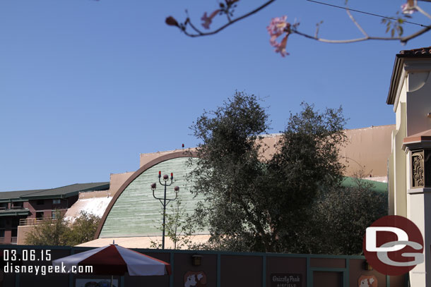 The former Taste Pilots Grill has a new wood/worn look and a new wood awning is visible.