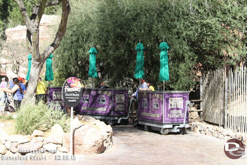 The temporary tents over the Fantasmic FastPass distribution machines are gone.  Some umbrellas are there now but were not in use today.