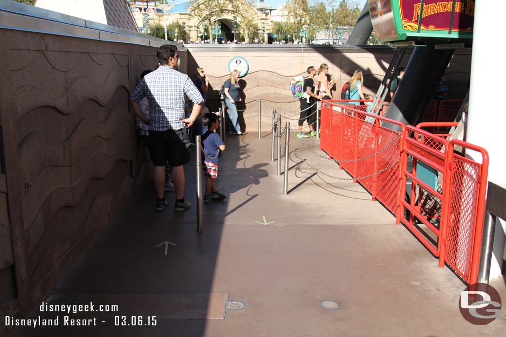 Stopped by the Fun Wheel.  The counters have been moved and guess you can call it directional signage (tape arrows) have been added to the ground.