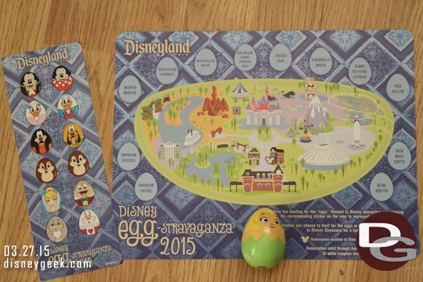 Here is the kit you get.. a map, sticker, and then a prize egg.  In this example it is Tinkerbell.