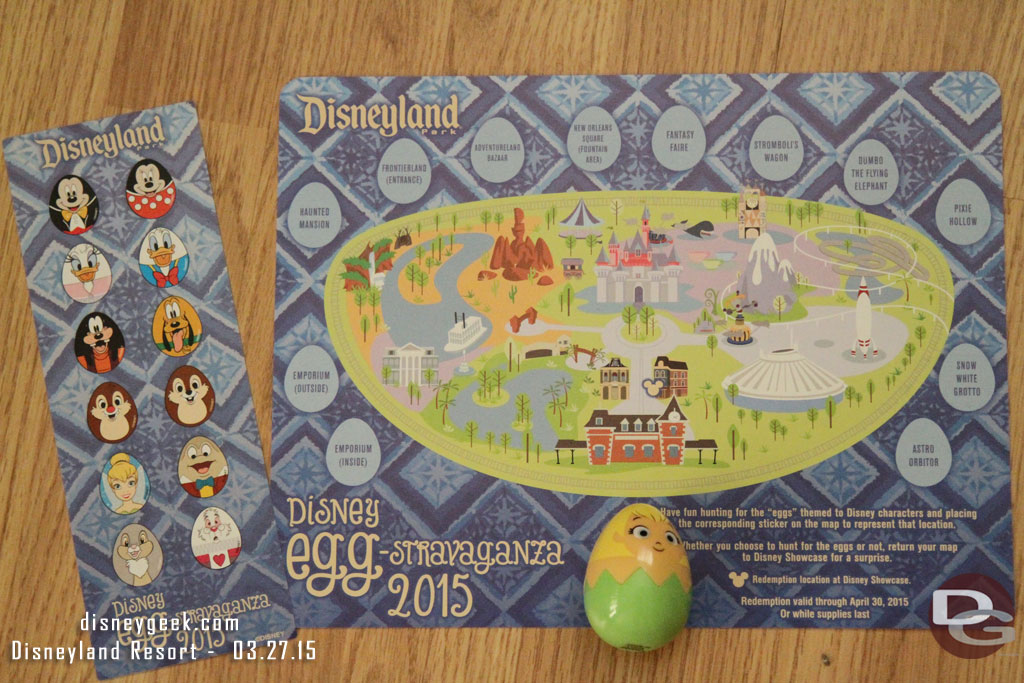 Here is the kit you get.. a map, sticker, and then a prize egg.  In this example it is Tinkerbell.