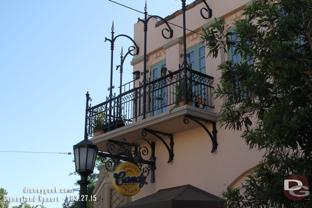 Starting off on Buena Vista Street with Mickey above Trolley Treats