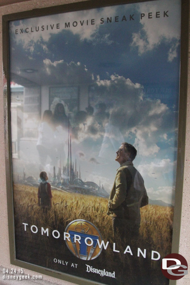 A Tomorrowland movie sneak peek poster as you enter the park.