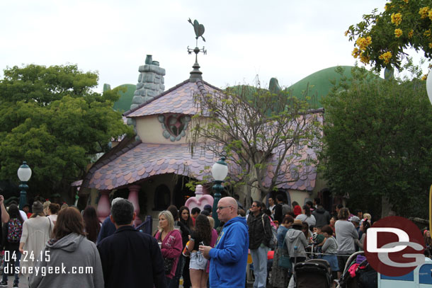 A long line outside Minnies house.. about half an hour if I remember right (Mickeys wait was the same).