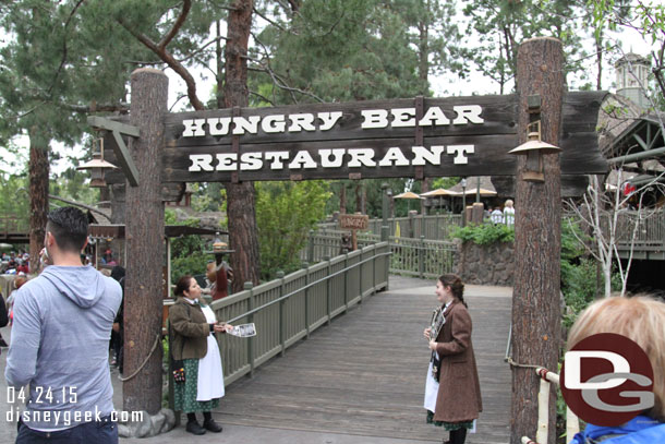 The Hungry Bear had cast members with menus at the entrance.