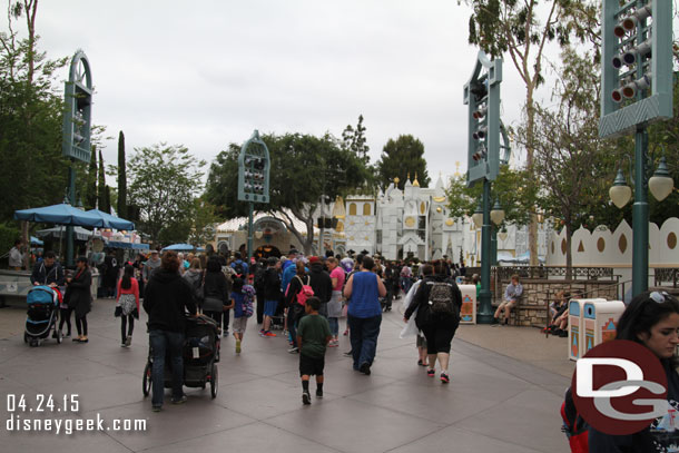 The Small World line backed up to the mall area. There was no extended queue set up so it looked worse than it was.