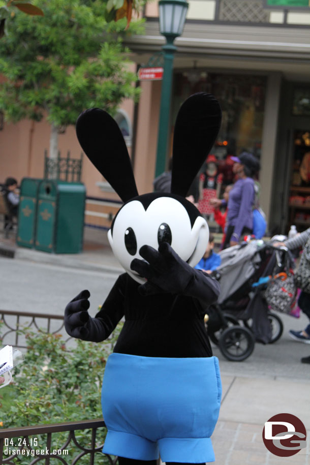 Oswald out on Buena Vista Street near the flag pole